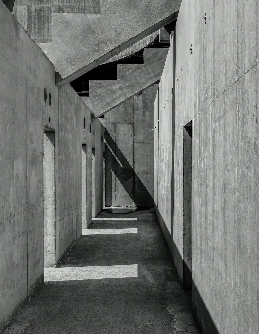 grayscale-photo-of-concrete-stairs.jpg grayscale photo of concrete stairs